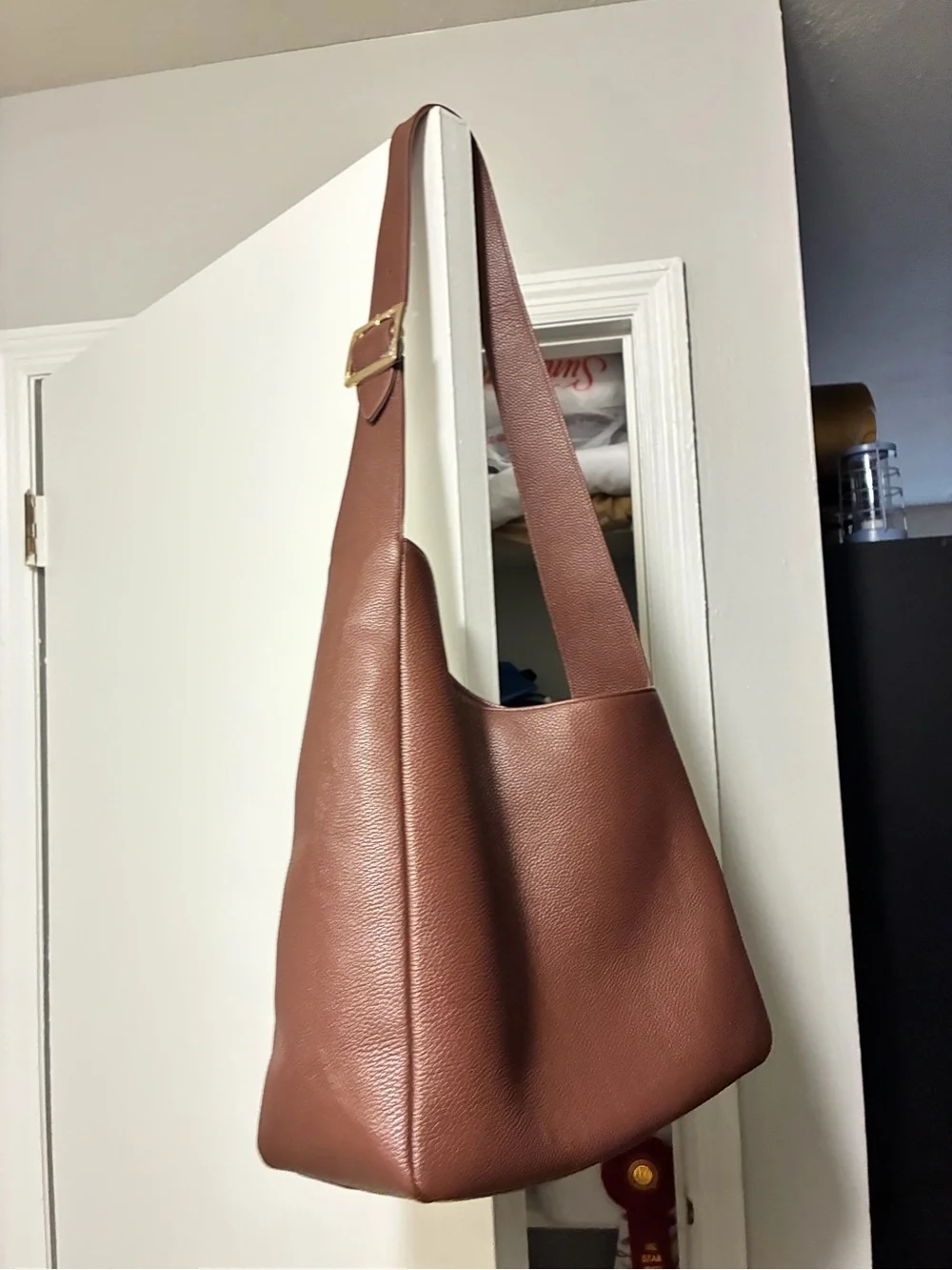 All on seven pebbled leather chocolate bag